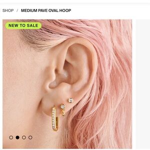 Studs brand medium pave oval hoop Earrings